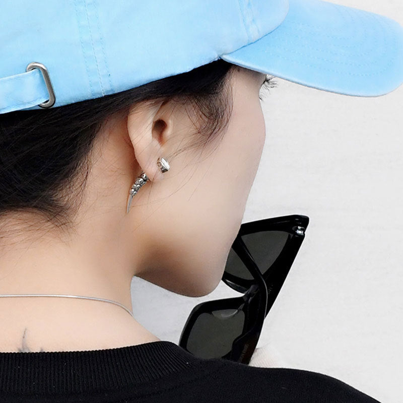 Vintage Wolf Tooth Skull Stud Earrings. Badass skull earrings. Skull earrings for men and women. Badass skull jewelry. Badass biker jewelry. badass skull accessories.