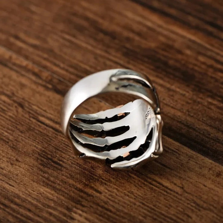 Sterling Silver Skeleton Hand Ring with Rose Gold Skull - Badass Skull Ring. Skull rings for men and women. Badass gifts for badass. Badass birthday gifts. Badass Christmas gifts for badasses. Badass skull accessories. Valentine gifts for him. Anniversary gift for him. Anniversary gift for my badass husband. Badass Birthday gift for my badass boyfriend. Badass Birthday gift for my badass husband.