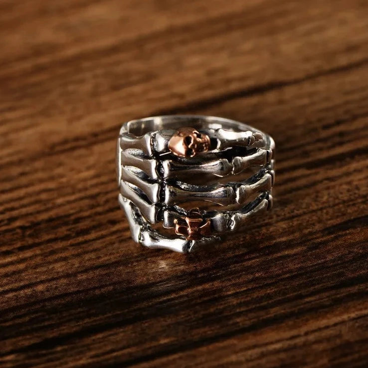 Sterling Silver Skeleton Hand Ring with Rose Gold Skull - Badass Skull Ring. Skull rings for men and women. Badass gifts for badass. Badass birthday gifts. Badass Christmas gifts for badasses. Badass skull accessories. Valentine gifts for him. Anniversary gift for him. Anniversary gift for my badass husband. Badass Birthday gift for my badass boyfriend. Badass Birthday gift for my badass husband.