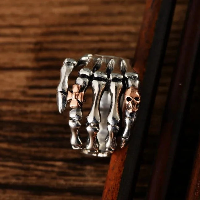 Sterling Silver Skeleton Hand Ring with Rose Gold Skull - Badass Skull Ring. Skull rings for men and women. Badass gifts for badass. Badass birthday gifts. Badass Christmas gifts for badasses. Badass skull accessories. Valentine gifts for him. Anniversary gift for him. Anniversary gift for my badass husband. Badass Birthday gift for my badass boyfriend. Badass Birthday gift for my badass husband.