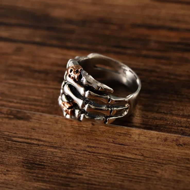 Sterling Silver Skeleton Hand Ring with Rose Gold Skull - Badass Skull Ring. Skull rings for men and women. Badass gifts for badass. Badass birthday gifts. Badass Christmas gifts for badasses. Badass skull accessories. Valentine gifts for him. Anniversary gift for him. Anniversary gift for my badass husband. Badass Birthday gift for my badass boyfriend. Badass Birthday gift for my badass husband.