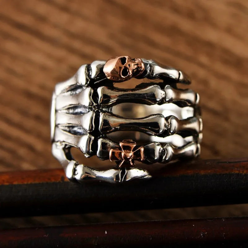 Sterling Silver Skeleton Hand Ring with Rose Gold Skull - Badass Skull Ring. Skull rings for men and women. Badass gifts for badass. Badass birthday gifts. Badass Christmas gifts for badasses. Badass skull accessories. Valentine gifts for him. Anniversary gift for him. Anniversary gift for my badass husband. Badass Birthday gift for my badass boyfriend. Badass Birthday gift for my badass husband.