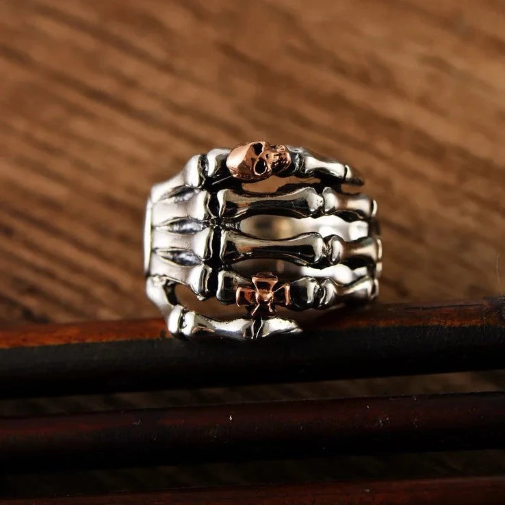 Sterling Silver Skeleton Hand Ring with Rose Gold Skull - Badass Skull Ring. Skull rings for men and women. Badass gifts for badass. Badass birthday gifts. Badass Christmas gifts for badasses. Badass skull accessories. Valentine gifts for him. Anniversary gift for him. Anniversary gift for my badass husband. Badass Birthday gift for my badass boyfriend. Badass Birthday gift for my badass husband.
