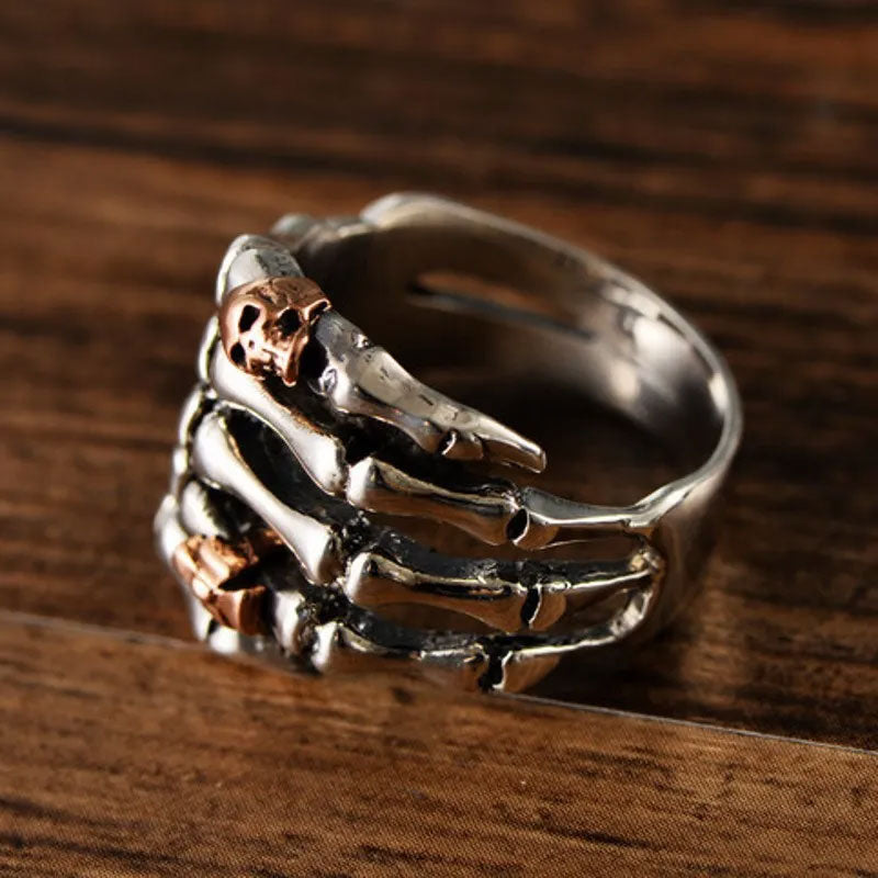 Sterling Silver Skeleton Hand Ring with Rose Gold Skull - Badass Skull Ring. Skull rings for men and women. Badass gifts for badass. Badass birthday gifts. Badass Christmas gifts for badasses. Badass skull accessories. Valentine gifts for him. Anniversary gift for him. Anniversary gift for my badass husband. Badass Birthday gift for my badass boyfriend. Badass Birthday gift for my badass husband.