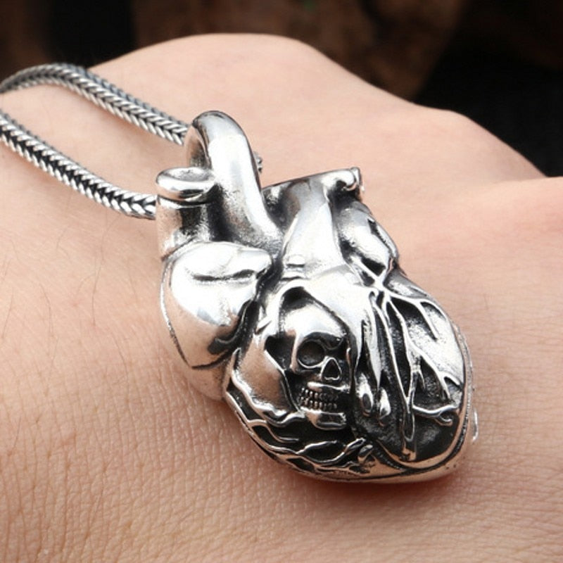 Pure Silver Skull Heart Pendant. Badass skull pendant for men. Badass gifts for badass. Badass birthday gifts. Badass Christmas gifts for badasses. Badass biker skull pendant necklace. Badass sbiker skull jewelry. Badass skull jewelry. Badass skull accessories.