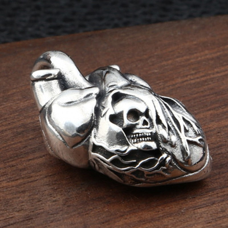 Pure Silver Skull Heart Pendant. Badass skull pendant for men. Badass gifts for badass. Badass birthday gifts. Badass Christmas gifts for badasses. Badass biker skull pendant necklace. Badass sbiker skull jewelry. Badass skull jewelry. Badass skull accessories.