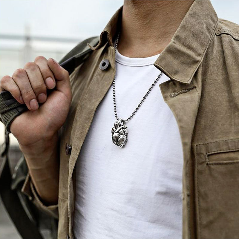 Pure Silver Skull Heart Pendant. Badass skull pendant for men. Badass gifts for badass. Badass birthday gifts. Badass Christmas gifts for badasses. Badass biker skull pendant necklace. Badass sbiker skull jewelry. Badass skull jewelry. Badass skull accessories.