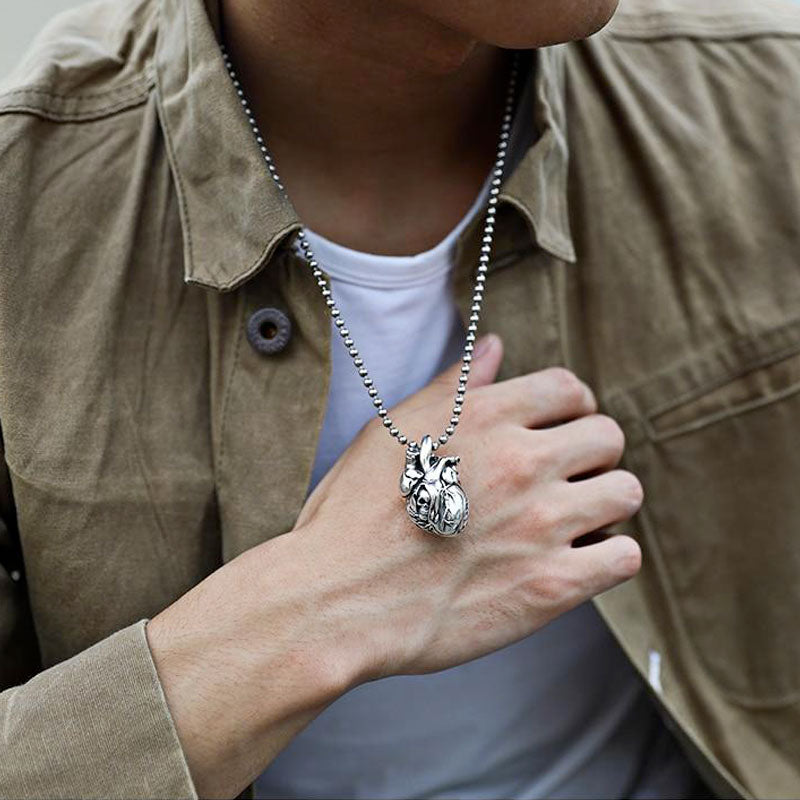 Pure Silver Skull Heart Pendant. Badass skull pendant for men. Badass gifts for badass. Badass birthday gifts. Badass Christmas gifts for badasses. Badass biker skull pendant necklace. Badass sbiker skull jewelry. Badass skull jewelry. Badass skull accessories.