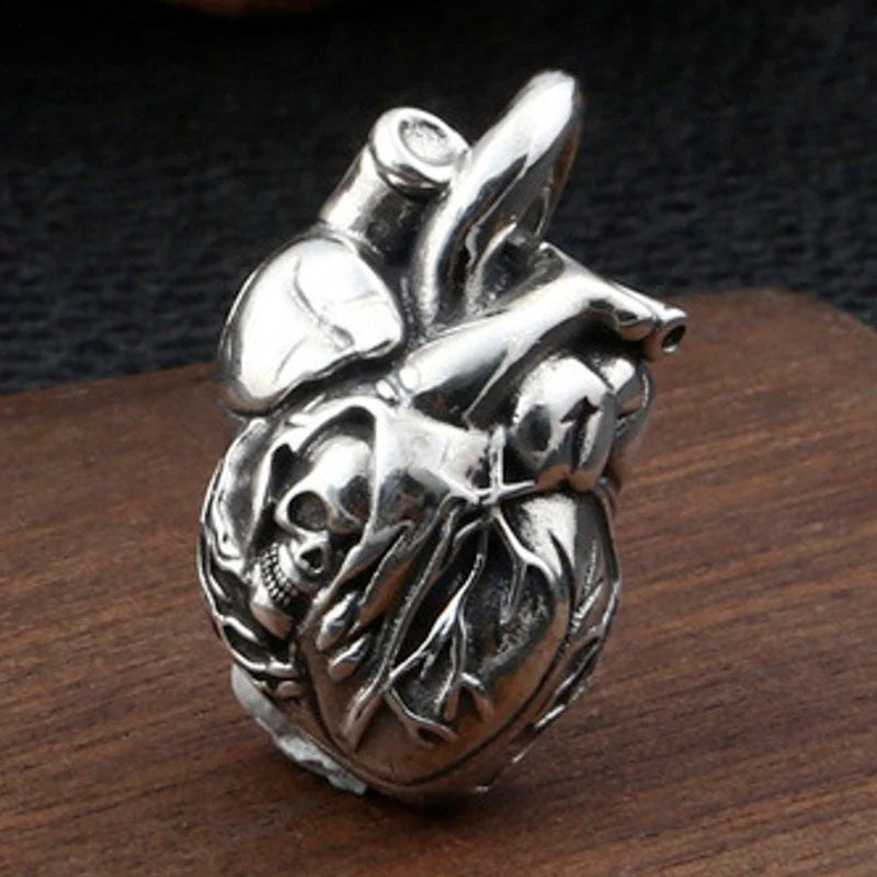 Pure Silver Skull Heart Pendant. Badass skull pendant for men. Badass gifts for badass. Badass birthday gifts. Badass Christmas gifts for badasses. Badass biker skull pendant necklace. Badass sbiker skull jewelry. Badass skull jewelry. Badass skull accessories.