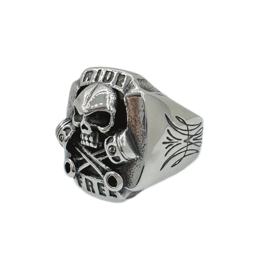 Ride Free Wrench Skull Ring – 316L Stainless Steel Biker Ring for Men and Women. Badass birthday gifts. Badass Christmas gifts for badasses. Badass skull accessories. Unique Valentine gifts for him and her. Anniversary gift for him and her. Unique Anniversary gift for my badass husband and wife. Unique Badass Birthday gift for my badass boyfriend and girlfriend. Unique Badass Birthday gift for my badass husband and wife. Coolest gift for dad. Special gift for father's day.