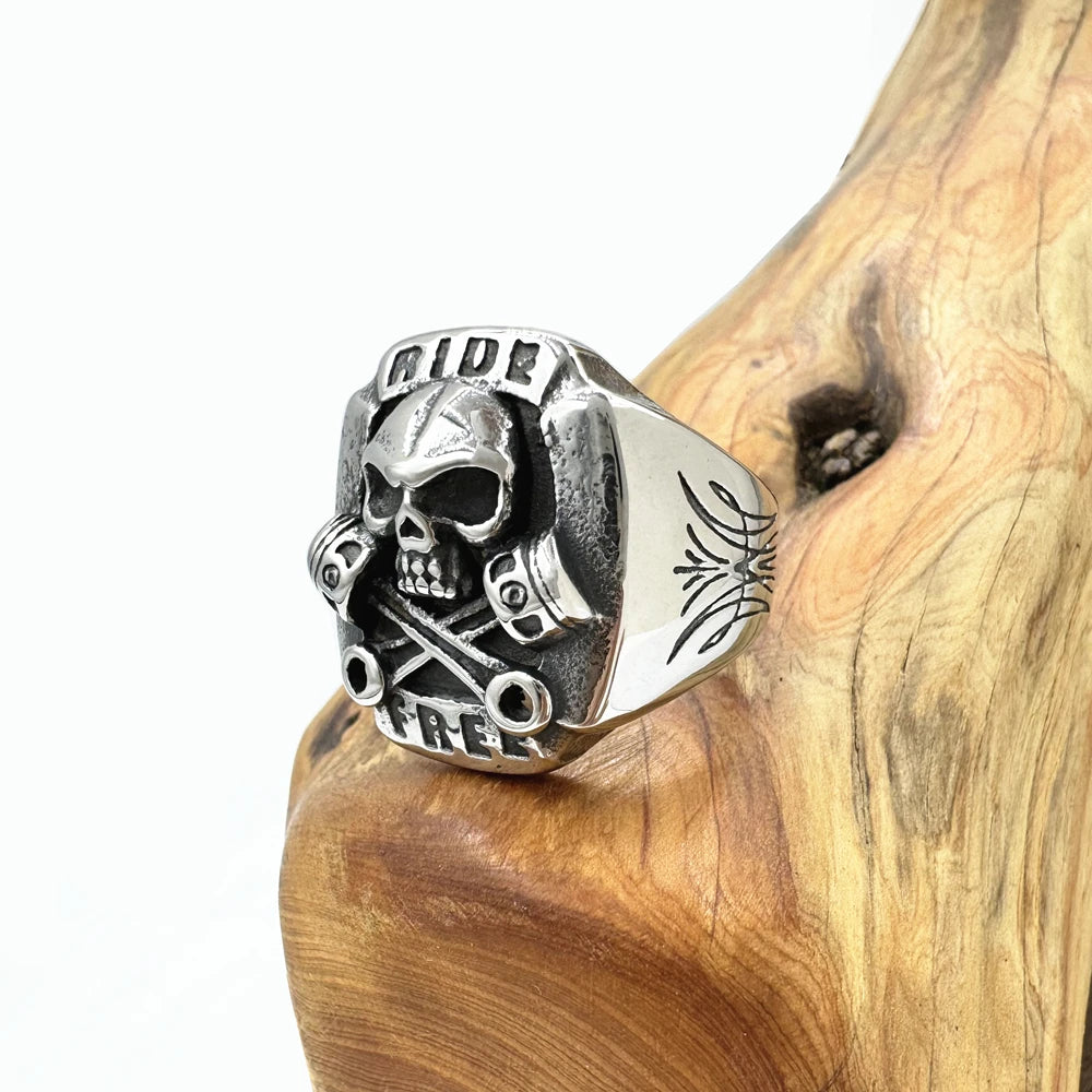 Ride Free Wrench Skull Ring – 316L Stainless Steel Biker Ring for Men and Women. Badass birthday gifts. Badass Christmas gifts for badasses. Badass skull accessories. Unique Valentine gifts for him and her. Anniversary gift for him and her. Unique Anniversary gift for my badass husband and wife. Unique Badass Birthday gift for my badass boyfriend and girlfriend. Unique Badass Birthday gift for my badass husband and wife. Coolest gift for dad. Special gift for father's day.