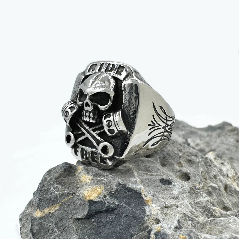 Ride Free Wrench Skull Ring – 316L Stainless Steel Biker Ring for Men and Women. Badass birthday gifts. Badass Christmas gifts for badasses. Badass skull accessories. Unique Valentine gifts for him and her. Anniversary gift for him and her. Unique Anniversary gift for my badass husband and wife. Unique Badass Birthday gift for my badass boyfriend and girlfriend. Unique Badass Birthday gift for my badass husband and wife. Coolest gift for dad. Special gift for father's day.
