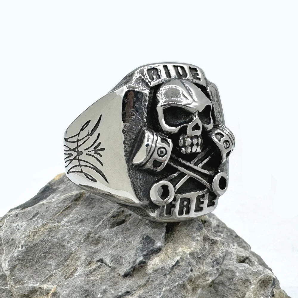 Ride Free Wrench Skull Ring – 316L Stainless Steel Biker Ring for Men and Women. Badass birthday gifts. Badass Christmas gifts for badasses. Badass skull accessories. Unique Valentine gifts for him and her. Anniversary gift for him and her. Unique Anniversary gift for my badass husband and wife. Unique Badass Birthday gift for my badass boyfriend and girlfriend. Unique Badass Birthday gift for my badass husband and wife. Coolest gift for dad. Special gift for father's day.