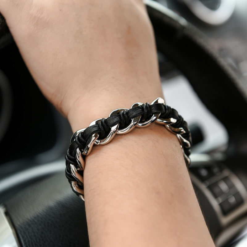 Dual Skull Stainless Steel Bracelet with Woven Cowhide. Badass skull bracelet. Badass biker skull bracelet. Badass skull jewelry. Badass skull accessories.